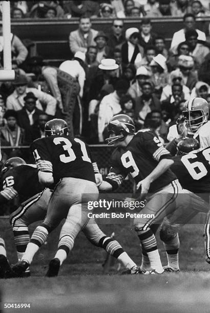 Redskins quarterback, Sonny Jurgensen , in action during Cleveland Browns game, at R. F. K. Memorial Stadium.