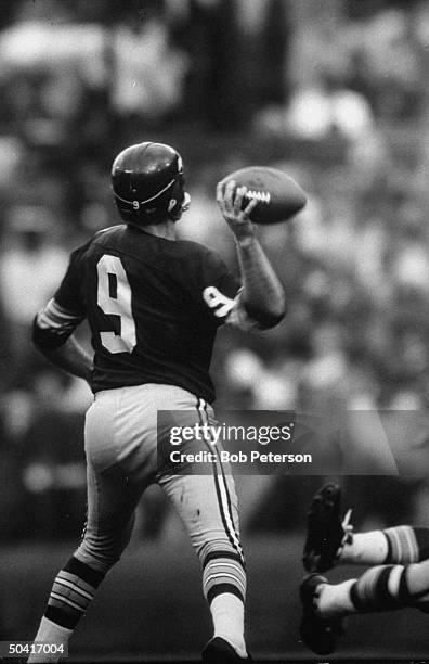 Redskins quarterback, Sonny Jurgensen , throwing ball during Cleveland Browns game, at R. F. K. Memorial Stadium.
