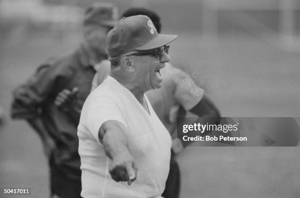 Redskins Coach, Vince Lombardi , leading his men in practice session, at R. F. K. Memorial Stadium.