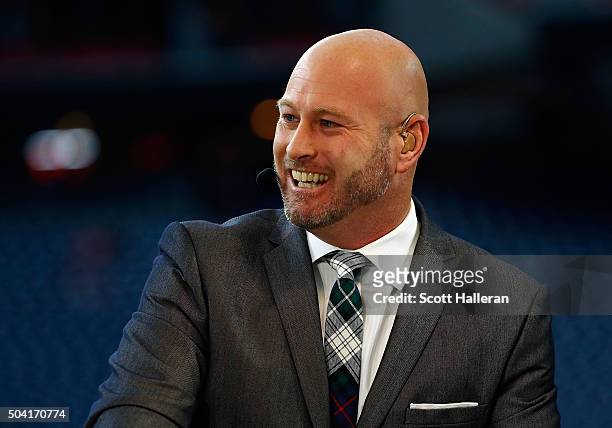 Former professional quarterback Trent Dilfer is seen on the ESPN set prior to the start of the AFC Wild Card Playoff game between the Houston Texans...
