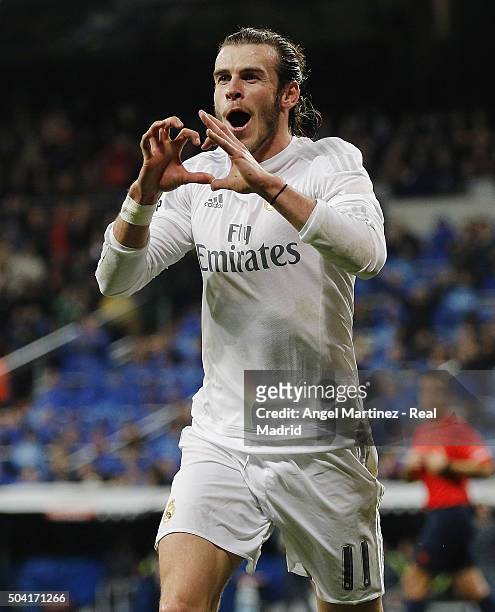 Gareth Bale of Real Madrid celebrates after scoring his team's fourth goal during the La Liga match between Real Madrid CF and RC Deportivo La Coruna...