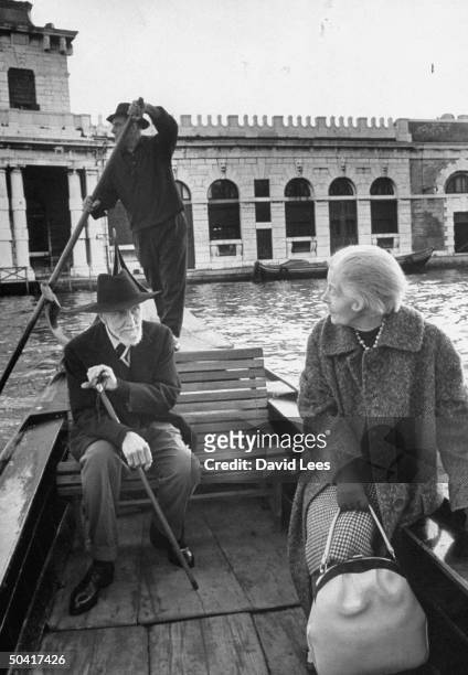 Olga Rudge and poet Ezra Pound , riding on canal.