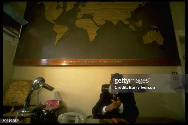 Muslim Brotherhood supreme spiritual ldr. Mohammed Hamed Abu Nasr during TIME interview in his world map adorned office.