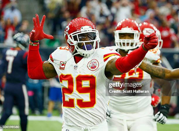 Eric Berry of the Kansas City Chiefs celebrates his first quarter interception against the Houston Texans during the AFC Wild Card Playoff game at...