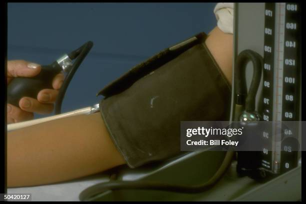 Blood pressure test being administered at Bellevue Hospital .