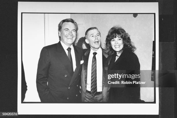 Actor Roddy McDowall posing w. Actor Robert Wagner & his girlfriend, actress Jill St. John, at party given in honor of his new book of photographs.