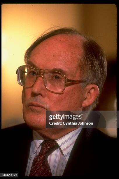 Supreme Court Chief Justice William Rehnquist in serious portrait, testifying on Capitol Hill.