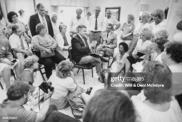 Disgraced PTL Minister Jim Bakker giving his first sermon to supporters, in the offices of the Bring Bakkers Back organization, located next to the...