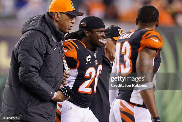 Reggie Nelson of the Cincinnati Bengals is helped off the field by training staff in the first half against the Pittsburgh Steelers during the AFC...