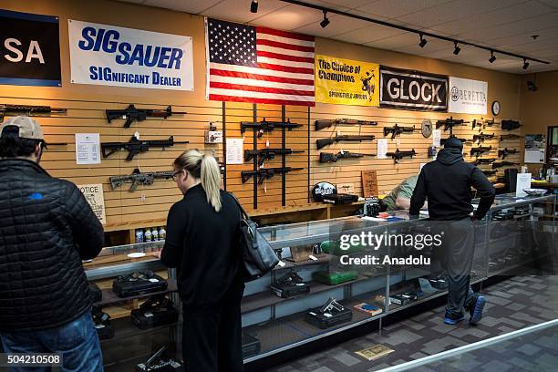 Customers shop at Blue Ridge Arsenal in Chantilly, Va., USA on January 9, 2015.