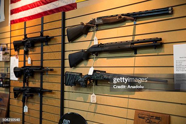 Shotguns and AR-15 style rifles for sale at Blue Ridge Arsenal in Chantilly, Va., USA on January 9, 2015.