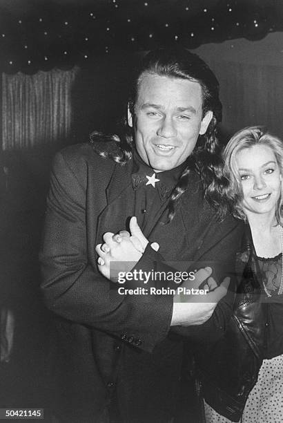 Actors Richard Tyson and Gail O'Grady attending a benefit screening of the motion picture Immediate Family, for the Pediatric AIDS Foundation.