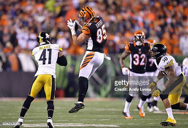 Tyler Eifert of the Cincinnati Bengals makes a reception in the first half against the Pittsburgh Steelers during the AFC Wild Card Playoff game at...