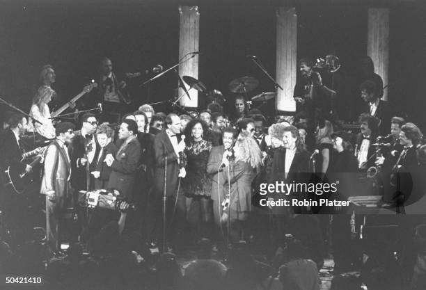 Mass of rock singers & musicians fill the stage as they perform the finale at the Rock & Roll Hall of Fame induction ceremony at the Waldorf-Astoria...