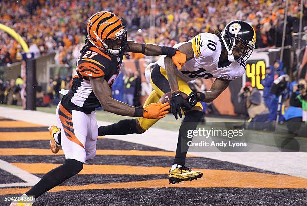 Martavis Bryant of the Pittsburgh Steelers scores a touchdown in the third quarter as Dre Kirkpatrick of the Cincinnati Bengals defends him during...