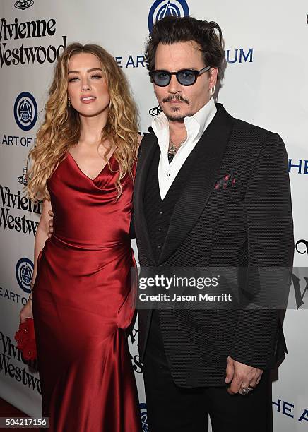 Actors Amber Heard and Johnny Depp attend The Art of Elysium 2016 HEAVEN Gala presented by Vivienne Westwood & Andreas Kronthaler at 3LABS on January...