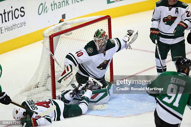 Devan Dubnyk of the Minnesota Wild in goal against the Dallas Stars in the third period at American Airlines Center on January 9, 2016 in Dallas,...