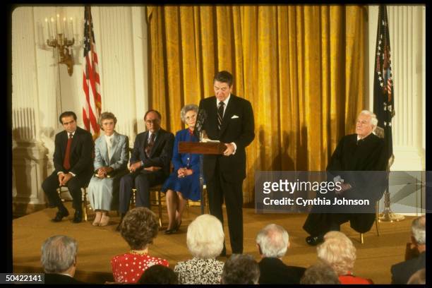 Chief Justice Burger, Pres. Reagan, Mrs & Rehnquist & Mrs & Justice Scalia, during Supreme Court swear-in ceremony.
