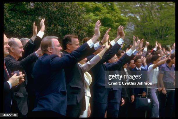 Bush & Cabinet members Weinberger, Pierce, Dole, Meese, Baldrige & Brady seeing Pres. Reagan off , on WH lawn.