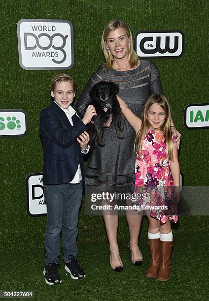 Benjamin Sanov, Ozzie the dog, actress Alison Sweeney and Megan Sanov arrive at the 2016 World Dog Awards at Barker Hangar on January 9, 2016 in...