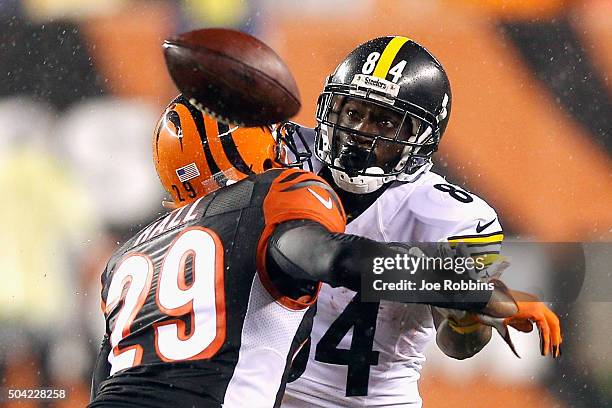 Antonio Brown of the Pittsburgh Steelers is unable to catch a pass as he is defended by Leon Hall of the Cincinnati Bengals in the fourth quarter...