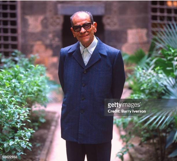 Nobel Prize winning author Naguib Mahfouz at old Arab courtyard home, Beit al-Suhaymi, in Gamaliya quarter where he grew up.