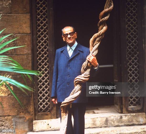 Nobel Prize winning author Naguib Mahfouz at old Arab courtyard home, Beit al-Suhaymi, in Gamaliya quarter where he grew up.