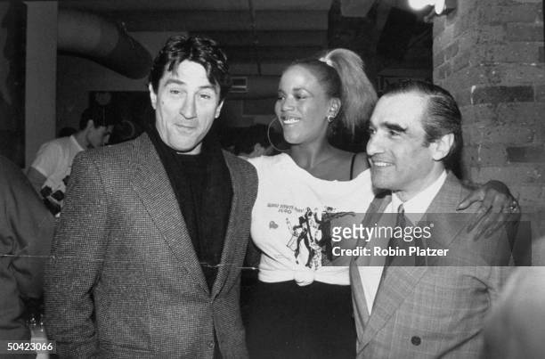 Actor Robert De Niro, girlfriend, actress Toukie Smith, and film director Martin Scorsese at the Willi Smith Day benefit at the Tribeca Grill, a...