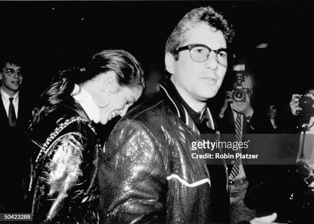Actor Richard Gere and girlfriend, model Cindy Crawford, both in leather jackets, on their way to the premiere of Cinema Paradiso..