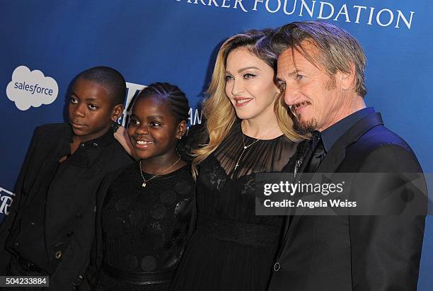 David Banda, Mercy James, musician Madonna and host Sean Penn attend the 5th Annual Sean Penn & Friends HELP HAITI HOME Gala benefiting J/P Haitian...