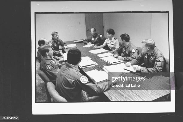 Lt. Col. Kelly Hamilton-Barlow heading meeting of 305th Air Refueling Wing pilots & navigators amongst colleagues at Grissom Air Force Base, Peru, IN.