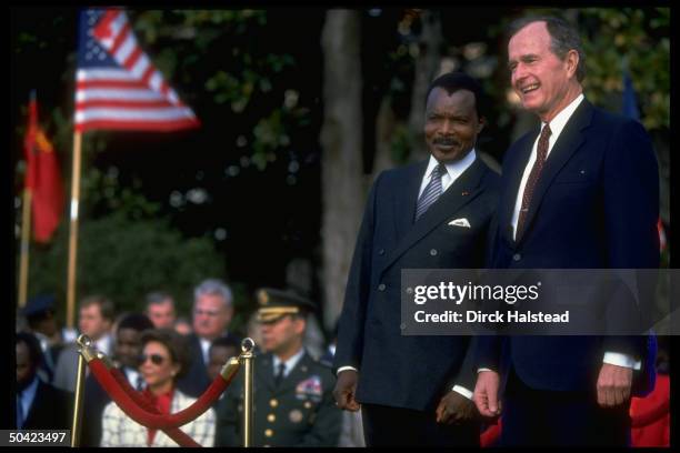 Pres. Bush w. Pres. Denis Sassou-Nguesso of Congo during WH departure/arrival fete.