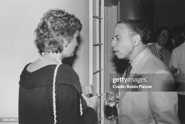 Editor of Vanity Fair Tina Brown talking to publisher Samuel I. Newhouse Jr. At book party.