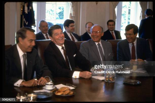 Pres. Reagan mtg. W. GOP ldrship Reps Trent Lott, Bob Michel & Bob Dole, re Saudi arms sales, in jelly bean jar-equipped WH Cabinet Rm.