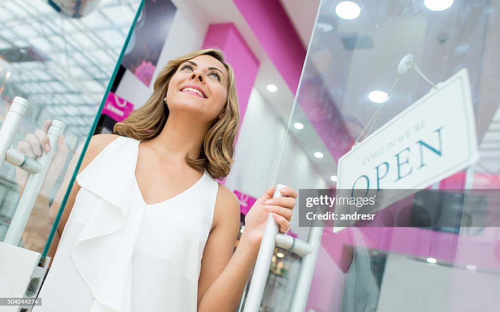 Woman opening a beauty store