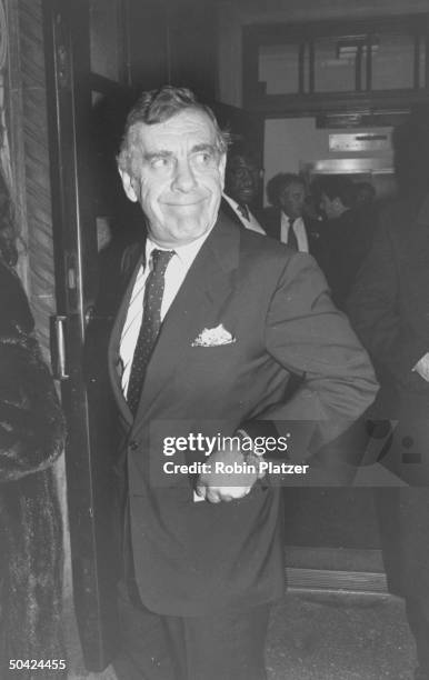 Newsman Morley Safer, hand in pocket, leaving Temple where William S. Funeral was held.