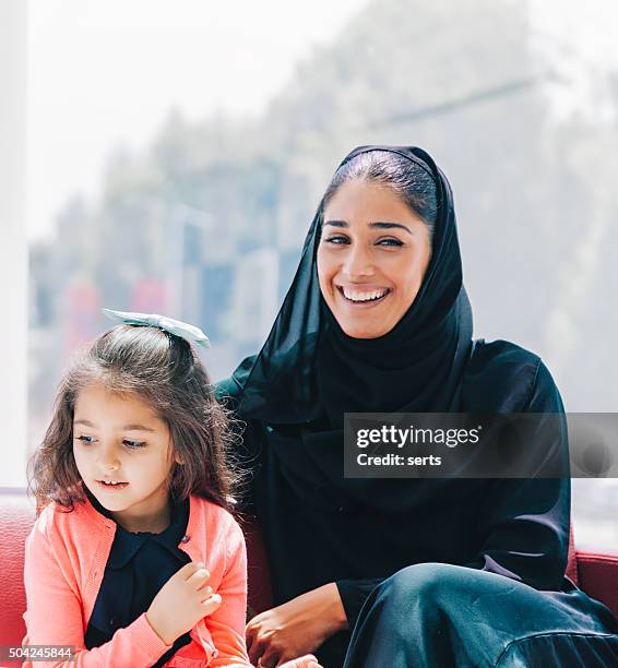 Traditional Arabic family enjoying at lounge