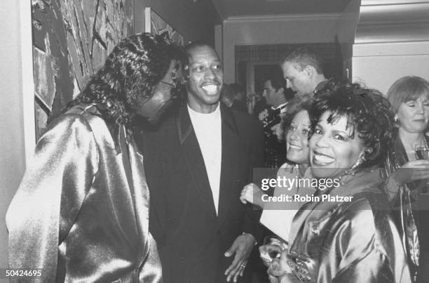 Married singers Nicholas Ashford and Valerie Simpson w. Singers Jeffrey Osborne and Lesley Gore at a party to celebrate the Grammy Awards.