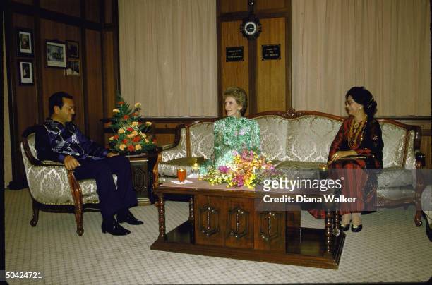 Nancy Reagan at preprandial mtg. W. PM Mahathir & wife Dr. Siti Hasmah at Sri Perdana in Kuala Lumpur, Malaysia.