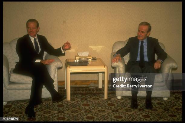 Pres. Hafez Al Assad engaging in post-gulf war mtg. W. US State Secy. Jim Baker.