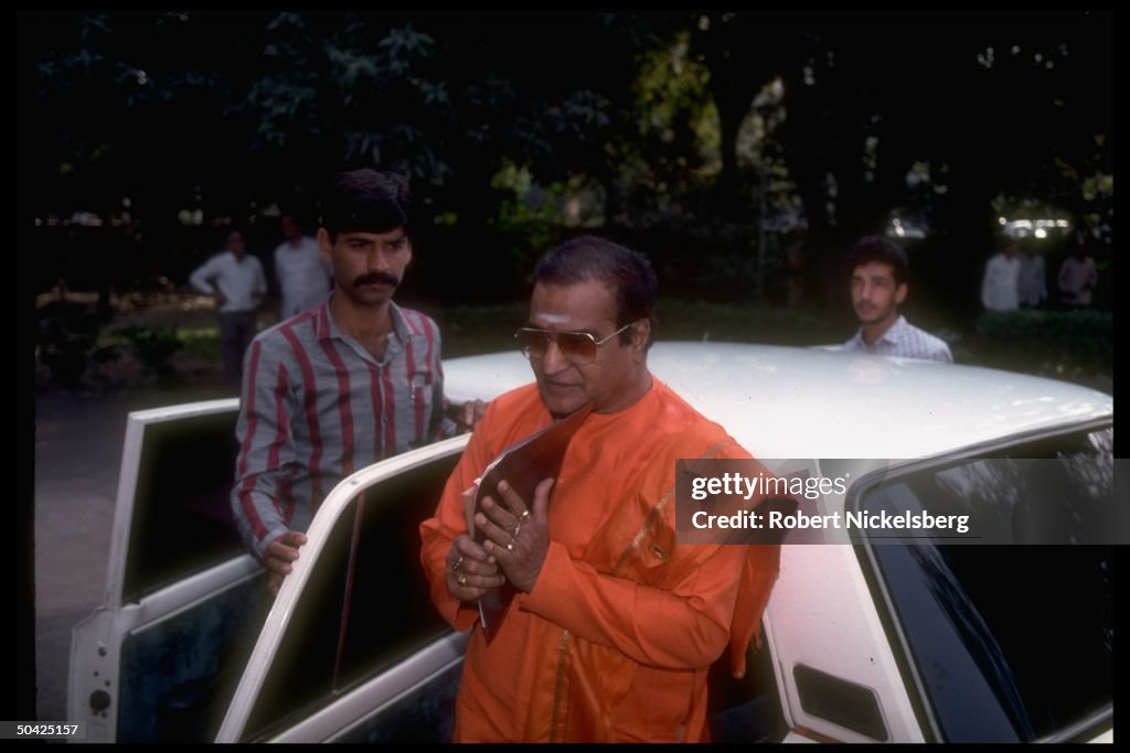 Santa Rameswar Rao Natl. Front's N. T. Rama Rao poised by car before/after party mtg. News ...