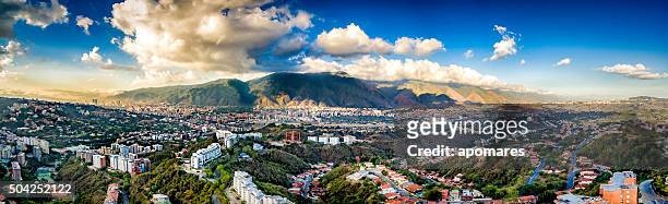 panoramic image of caracas city aerial view with el avila - caracas stock pictures, royalty-free photos & images