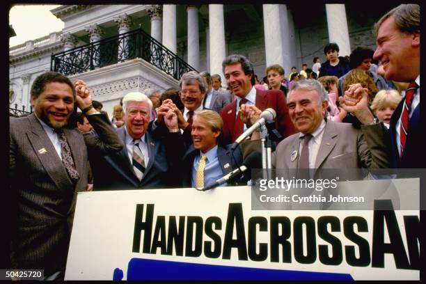 Preview of support of Hands Across America, Congressman Tip O'Neill , gymnast Bart Conner , & others on Capitol steps.