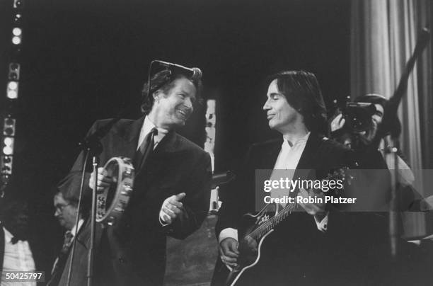 Musicians Don Henley w. Jackson Browne on stage at Rock Roll Hall of Fame dinner; Waldorf-Astoria.