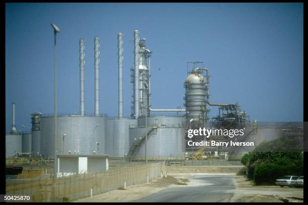 Saudi Aramco oil refinery & loading terminal storage & processing facilities at Ras Tanura, Saudi Arabia.