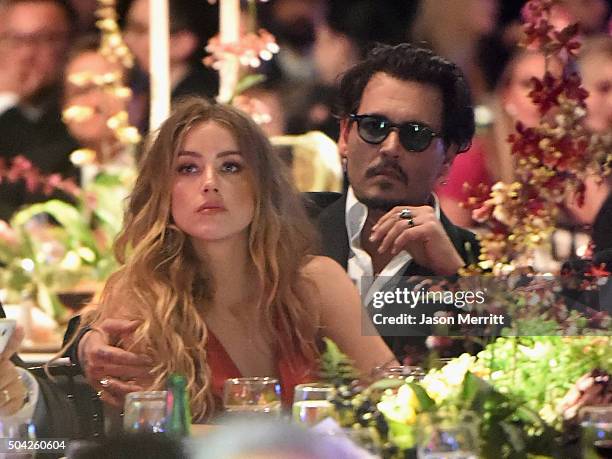 Actors Amber Heard and Johnny Depp attend The Art of Elysium 2016 HEAVEN Gala presented by Vivienne Westwood & Andreas Kronthaler at 3LABS on January...