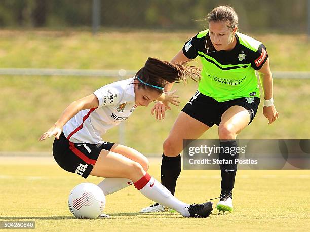 Helen Petinos of the Wanderers and Kendall Fletcher of Canberra United contest possession during the round 13 W-League match between Canberra United...