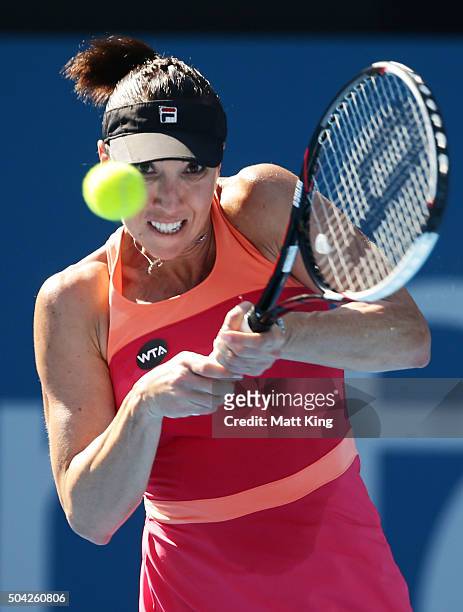 Jelena Jankovic of Serbia plays a backhand in her match against CoCo Andeweghe of the United States during day one of the 2016 Sydney International...