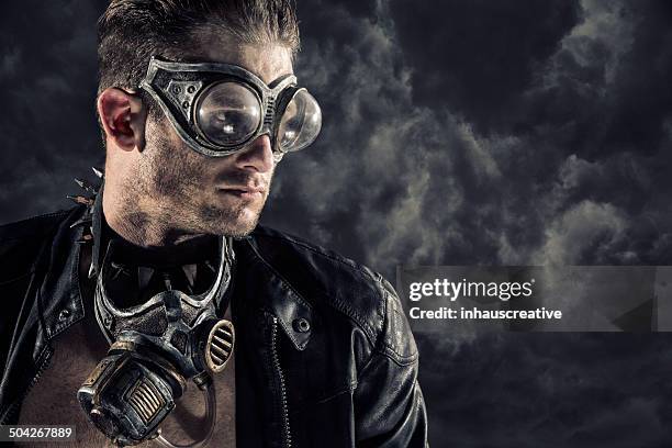 steampunk guy on a cloudy background - spike collar stock pictures, royalty-free photos & images