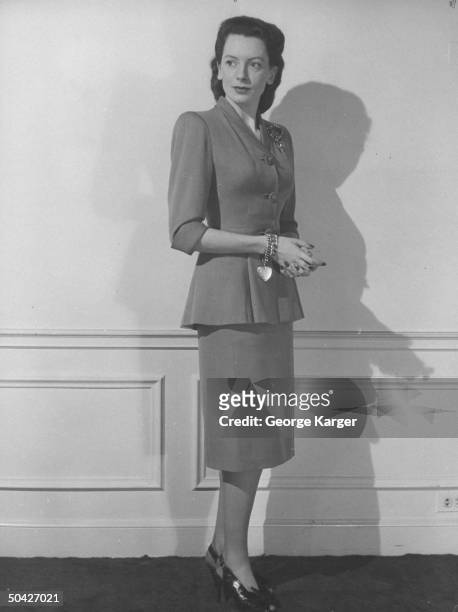British actress Deborah Kerr standing & wearing 40s style suit w. Slight peplum.